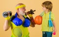 Family time together. Healthy grandfather and Grandson workout. Grandfather and kid sporting. Royalty Free Stock Photo