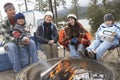 Family Toasting Marshmallow At Campfire
