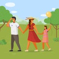 Family together outdoors, father, mother with little daughter holding balloon walk at summer park Royalty Free Stock Photo