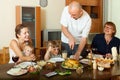 Family together over dining table Royalty Free Stock Photo