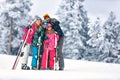 Family together skiing on mountain Royalty Free Stock Photo