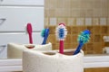 Family toothbrushes in front of mirror. Used toothbrushes. Royalty Free Stock Photo