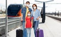 family in masks with travel bags over train Royalty Free Stock Photo