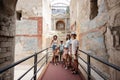 Family tourist posed at Pompeii ancient city, Italy