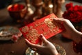 Family tradition Hand receiving red envelopes, symbolizing Chinese New Year
