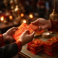 Family tradition Hand receiving red envelopes, symbolizing Chinese New Year