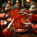 Family tradition Hand receiving red envelopes, symbolizing Chinese New Year