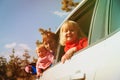 Family travel by car- father with kids driving in mountains Royalty Free Stock Photo