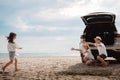 Family travel car road trip concept. summer vacation in car in the sunset, Dad, mom and daughter happy traveling enjoy and Royalty Free Stock Photo