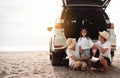 Family travel car road trip concept. summer vacation in car in the sunset, Dad, mom and daughter happy traveling enjoy and Royalty Free Stock Photo