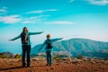 Family travel- mother and son hiking in mountains Royalty Free Stock Photo