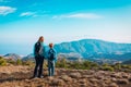 Family travel- mother and son hiking in mountains Royalty Free Stock Photo