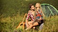 Family travel. Summer vacation. Boyfriend girlfriend guitar near camping tent. Camping vacation. Hiking romance. Camping Royalty Free Stock Photo