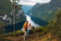 Family traveling in Norway sightseeing Geiranger fjord Father and mother with infant baby hiking outdoor active healthy lifestyle Royalty Free Stock Photo