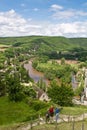 Family travelling to river Lot canyons in scenic green countryside top view in blue sky, France