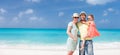 Family on a tropical beach vacation Royalty Free Stock Photo