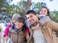 family with two children outdoors in sunny fall day Royalty Free Stock Photo