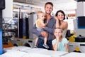 Family with two children shopping