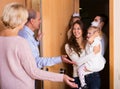 Family with two daughters visiting grand parents Royalty Free Stock Photo