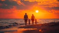 Family Union at Sunset: Mother, Father and Children Enjoy Warm Twilight Light on a Golden Beach Royalty Free Stock Photo