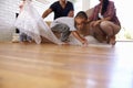 Family Unpacking Boxes In New Home On Moving Day Royalty Free Stock Photo