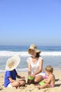 Family vacation on beach: Mother and kids Royalty Free Stock Photo