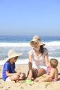 Family vacation on beach: Mother and kids Royalty Free Stock Photo