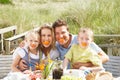 Family on vacation eating outdoors Royalty Free Stock Photo