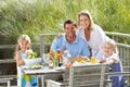 Family on vacation eating outdoors Royalty Free Stock Photo