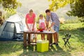 Family on vacation having barbecue Royalty Free Stock Photo