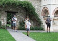 Family on vacation during the pandemic. Family with medical masks visits tourist attractions