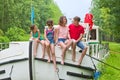 Family vacation, summer holiday travel on barge boat in canal, happy kids and parents having fun on river cruise trip in houseboat Royalty Free Stock Photo