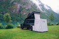 Family vacation travel, holiday trip in offroad car modified for camping, car Vacation. Beautiful Nature Norway landscape