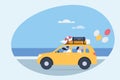 A family on a vacation trip travelling in a car on a beach road Royalty Free Stock Photo