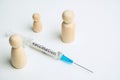 Family vaccination concept with syringe and abstract family
