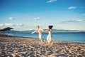 Family and valentines day. Summer holidays and travel vacation. Sexy woman and man at sea. Couple in love dance on beach Royalty Free Stock Photo