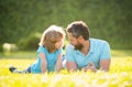 family value. childhood and parenthood. parent relax with little child boy on grass.