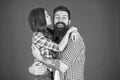 Family values concept. Family bonds. Friendly relations. Father hipster and his daughter. Sweet hug. Man bearded father