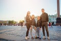 Family of parents and little girls visiting the Hermitage, Saint-Petersburg.