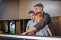 Family visiting a natural history museum, a mother with two children Royalty Free Stock Photo