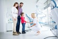 Family visits dentist in dental office