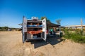 Family waking up in a campervan on the beach