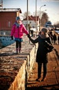 Family walk on Darlowo pier Royalty Free Stock Photo