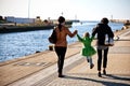 Family walk on Darlowo pier Royalty Free Stock Photo