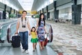 Family walking in the airport hall Royalty Free Stock Photo