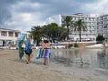 SAN Antonio Ibiza Spanish coast family walking along beach in September