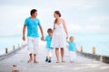 Family walking along jetty Royalty Free Stock Photo