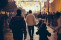 Family walking at christmas night