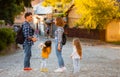 Family walking down the street of old city Royalty Free Stock Photo