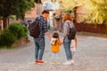 Family walking down the street of old city Royalty Free Stock Photo